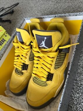 Jordan Retro 4 High-Top Sneakers in Yellow and Black Lightning